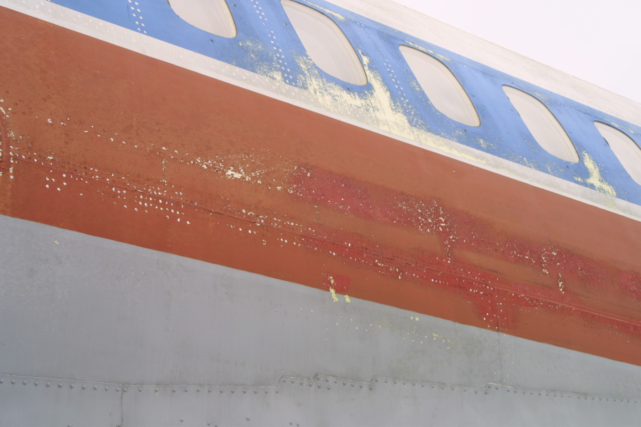 Close-up of the weathered fuselage skin of Ural Airlines Tu-154B-2 RA-85459